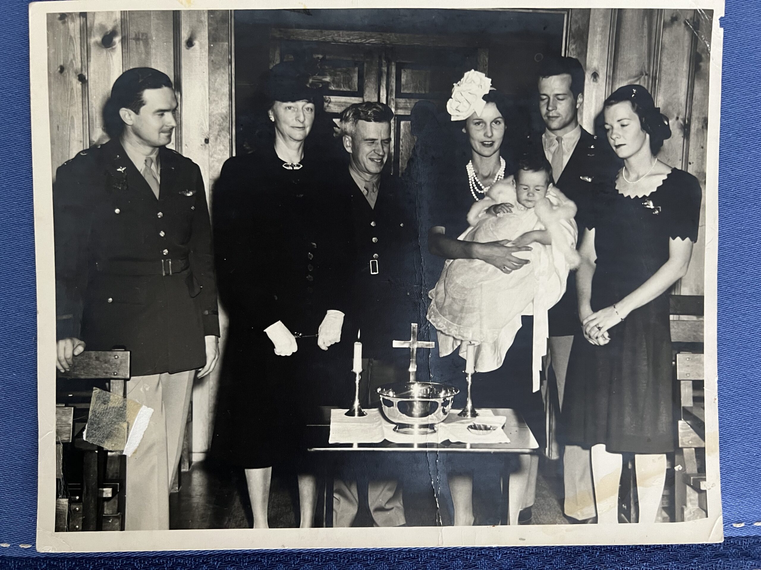 Baptism of Barbara Mary Kent Lawrence at New Castle Army Air Base, October 3, 1943.  Left to right: possibly Major R. VC McLaughlin; Mrs Gladys Irwin, godmother; unknown officer, Barbara Greene Lawrence holding Barbara Mary Kent Lawrence; Connor Lawrence; Cotty Pell, godmother With permission of the Office of Public Affairs at Dover Air Force base under the Freedom of Information Act.  Photograph by the Base Photographic Unit, New Castle Army Air Base, Wilmington, Delaware.