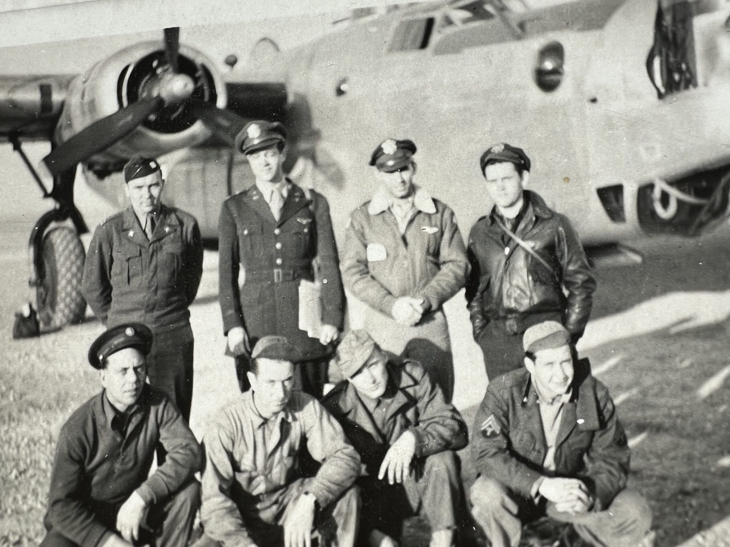 Captain Connor Lawrence, (back row second from left) and crew Family photograph