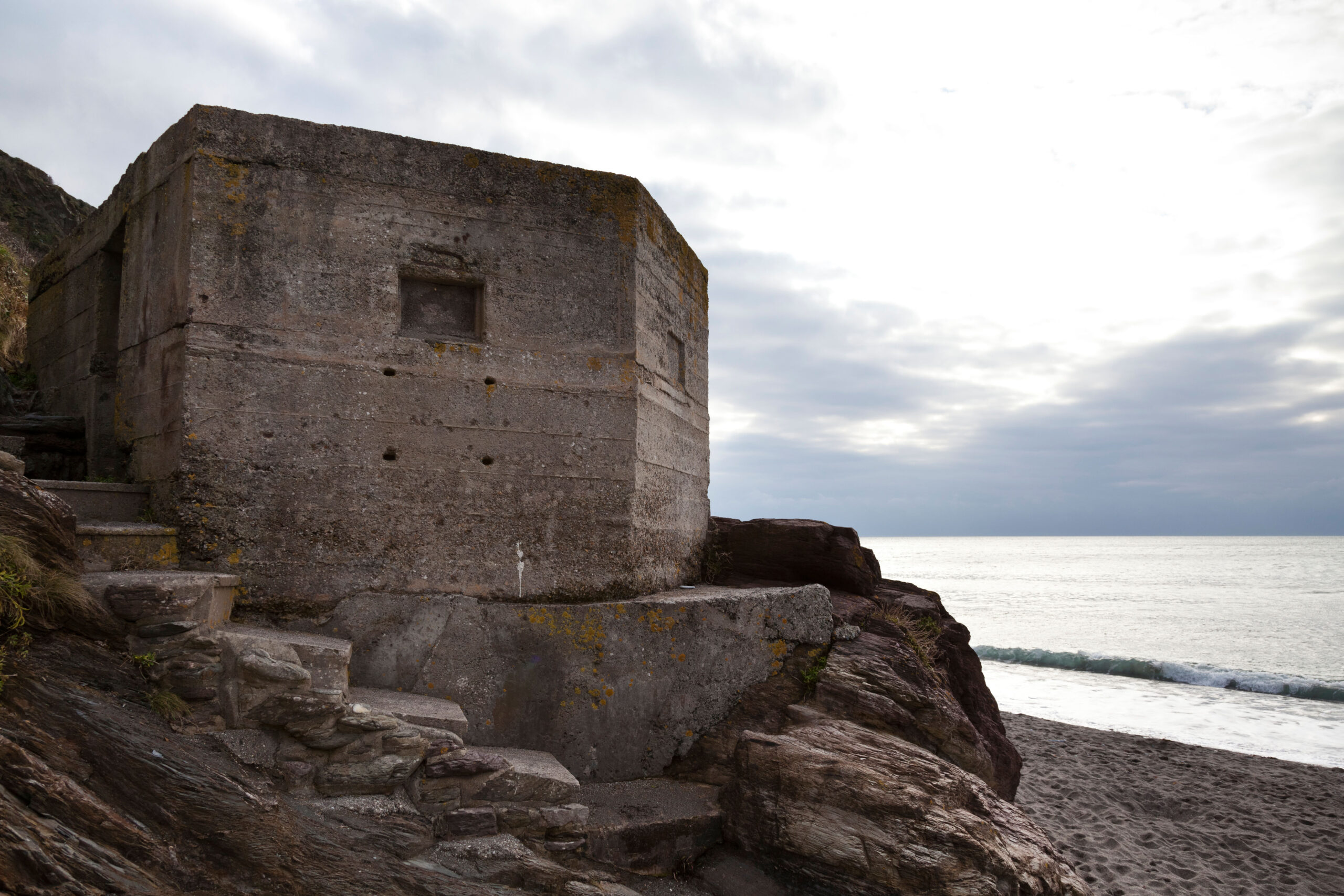 Old WWII pill box on Finnygook Beach, Portwrinkle, Cornwall, England.  Anthony Hatley/ Alamy Stock Photo